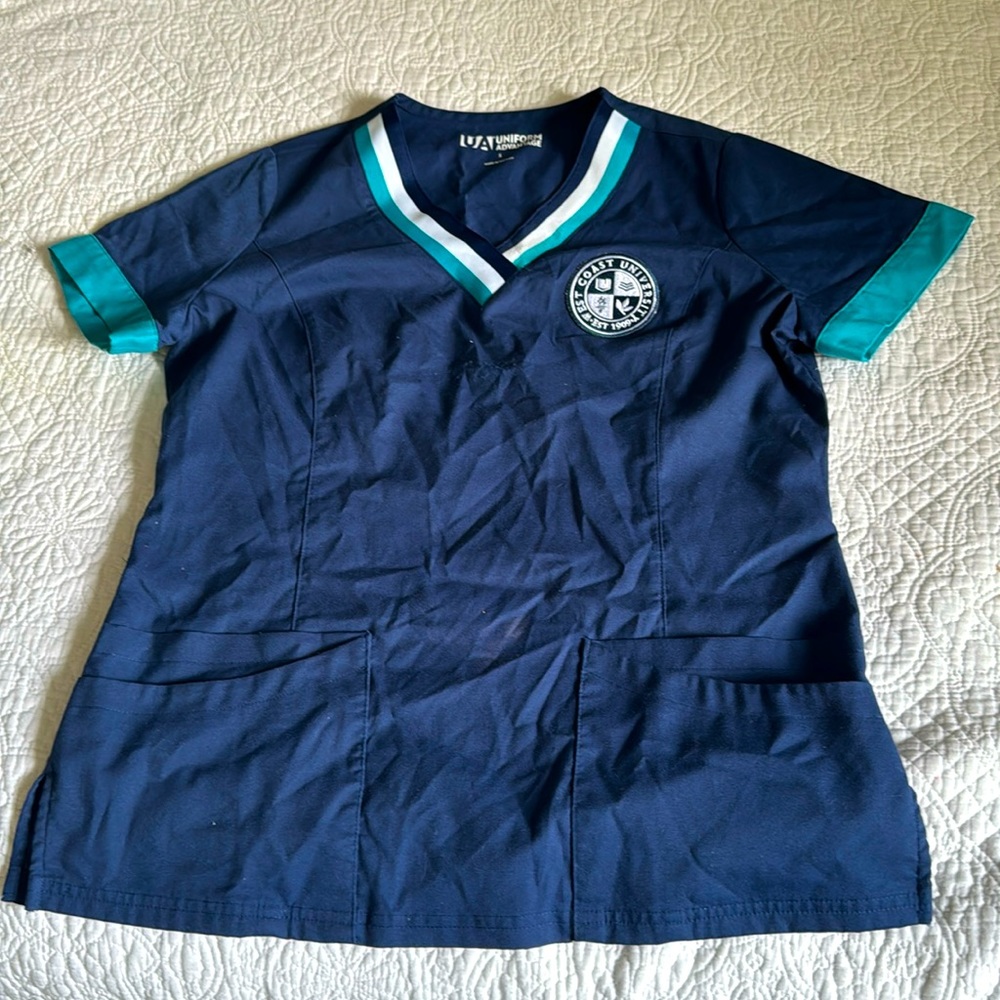 Westcoast university scrub top in great condition with logo selling as is